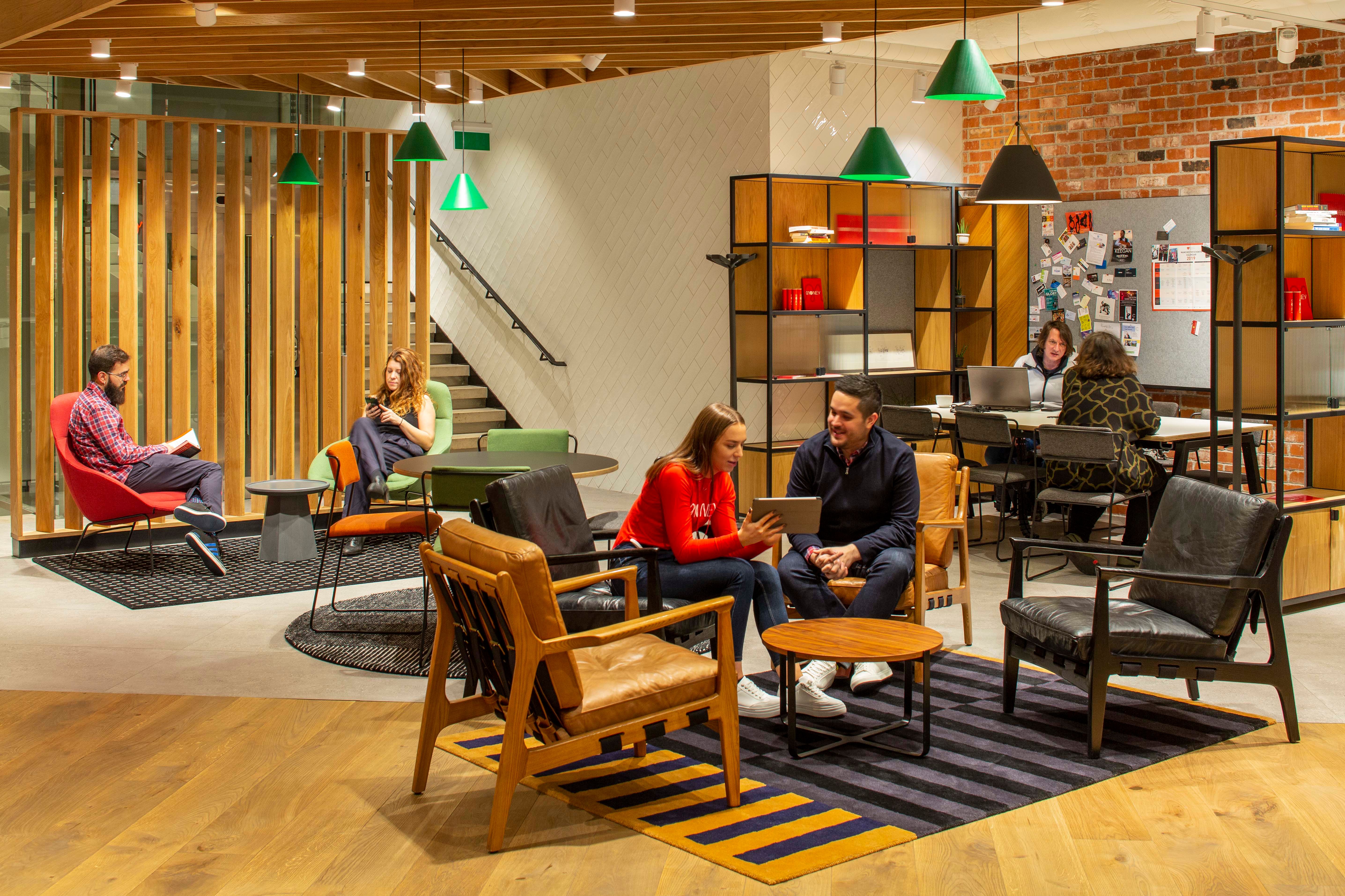 People sitting at the Virgin Money Manchester store