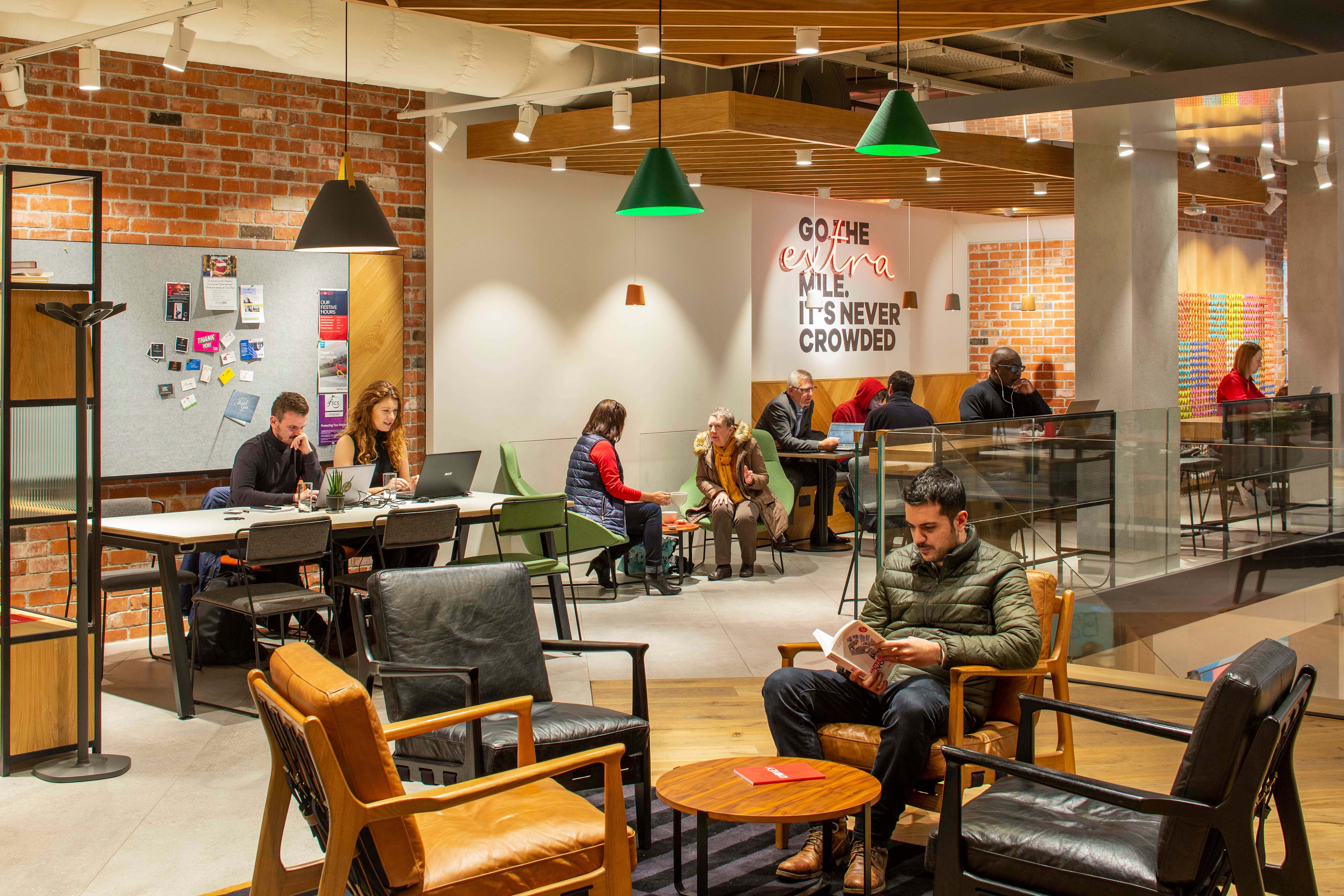 People sitting at the Virgin Money Manchester store