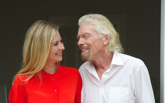 Richard and Holly Branson smiling at each other