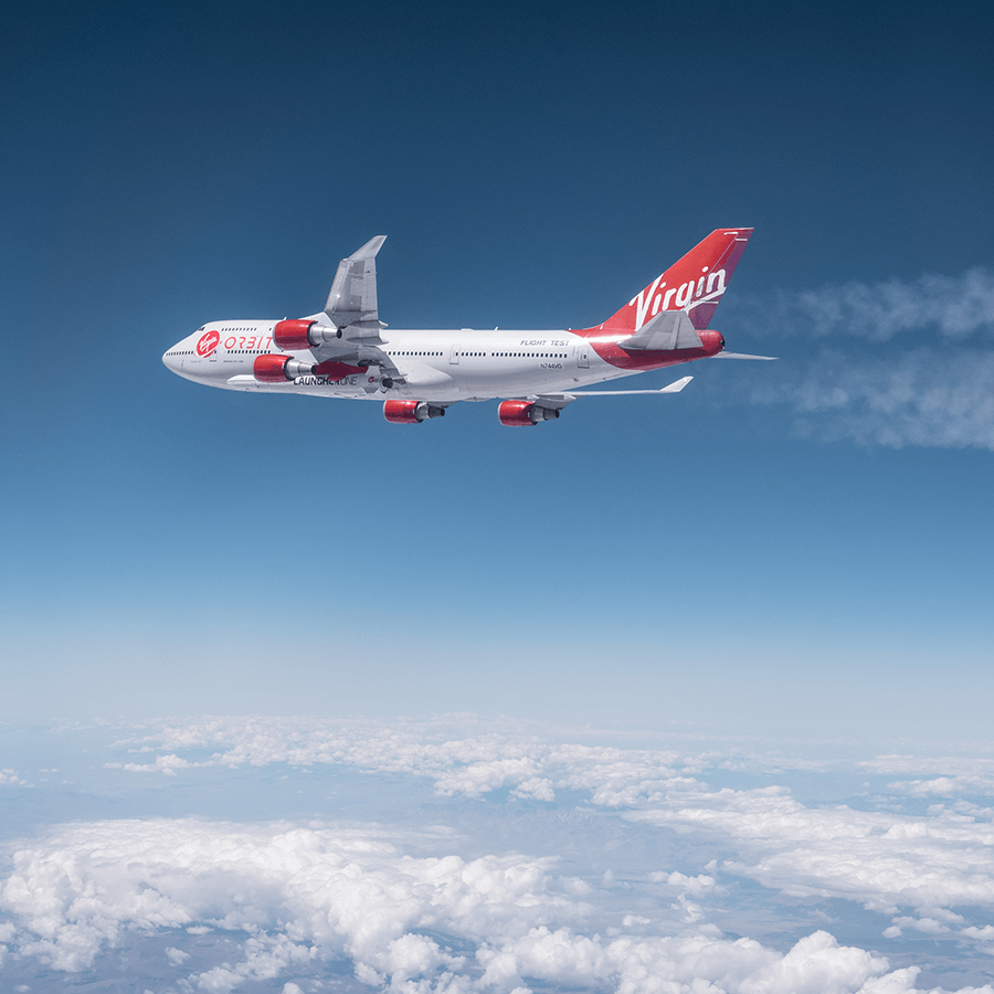 An image of Cosmic Girl flying above the clouds